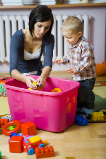 Woman and toddler with toys - By Fotolia